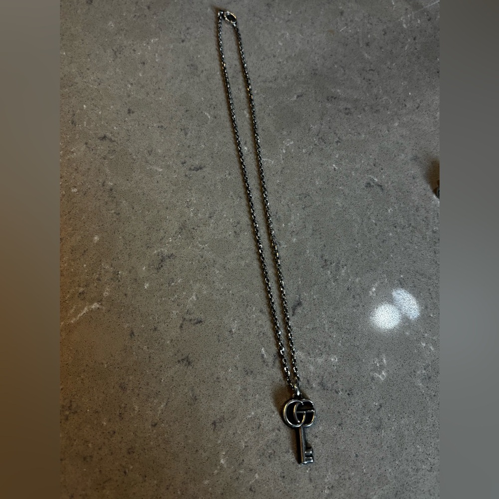 Double g key necklace